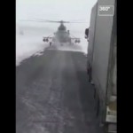 Боевой вертолет присел на трассу спросить у дальнобоев дорогу…